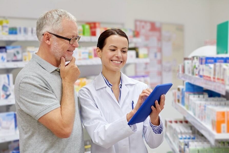 A doctor prescribes anti-parasitic medication for a man